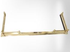 A brass extending fire curb