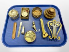 An Emca boy scout's whistle fitted with a compass together with an onyx and brass cigar cutter,