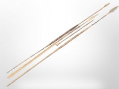 A group of metal-tipped spears, longest 183cm.