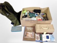 A box of fishing equipment, line, bate box,