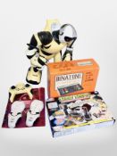 A Robosapien remote control robot, together with a Binatone TV game,