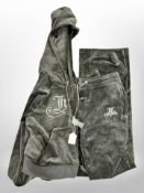 A Juicy Couture two-piece tracksuit, with retail tags, size large,