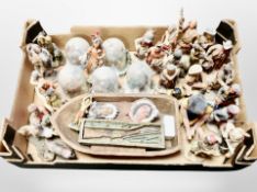 A box of diecast resin Native American figures.