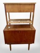 A 20th century Danish teak fall front entertainment cabinet,