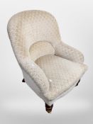 A lady's chair on brass castors