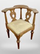 A 19th century Scandinavian oak corner armchair