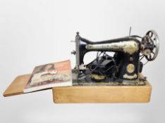 A Singer electric sewing machine with pedal