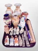 A group of oriental ceramics including Japanese satsuma vases, Chinese carved soapstone figures,