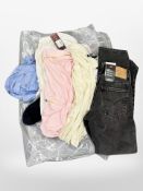 A pair of Levi middy straight black jeans, size 25, new and tagged,