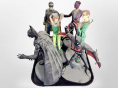 Six diecast resin Batman figures.