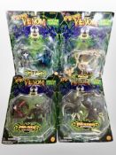 Four Toy Biz Marvel Comic's Spider-Man toys in retail packaging.