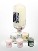 A group of candles including Yankee,