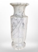 A polished marble vase, height 46cm.