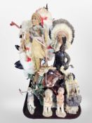 A group of diecast resin Native American figures.
