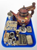 A group of brass wares, weights, iron, pewter tankards, a painted wooden teapot,