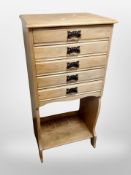 An Edwardian five drawer music chest,