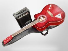 A Jack Strings semi-acoustic guitar, together with a Rockburn mini amplifier with lead.