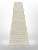 A contemporary flat weave runner,