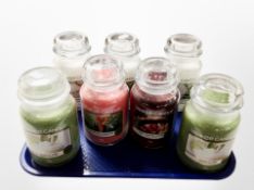 Seven Yankee Candles.