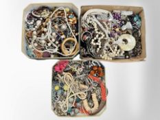 Three boxes containing costume jewellery, beaded necklaces, bangles, etc.