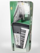 A Yamaha YPT-255 keyboard in box