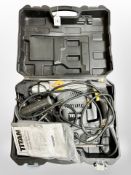 A Titan rotary hammer drill in case