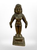 A 19th century Tibentan brass devotional temple statue, height 11.
