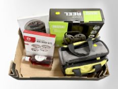 A box of new retail stock items - Bottle of pink port, Ryobi tool in bag,