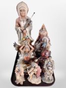 A group of diecast resin Native American figures.