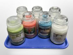 Seven Yankee Candles.