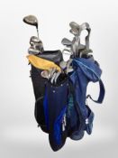 Three golf bags containing assorted irons and drivers, Slazenger,
