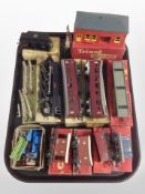 A group of rolling stock, including Tri-ang, other model railway decorations,
