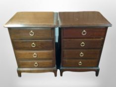 A pair of Stag Minstrel four-drawer bedside stands, width 53cm.