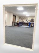 A Victorian-style bevelled mirror, 130cm x 100cm.