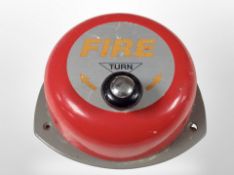 A vintage hand-cranked fire alarm.