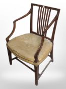 A 19th century mahogany armchair in studded floral upholstery