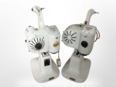 A vintage Italian enamelled projector and one other.