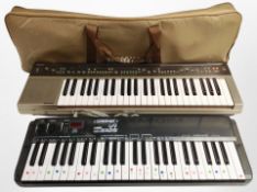 A Yamaha PC-1000 digital keyboard and a further Midiman keyboard.