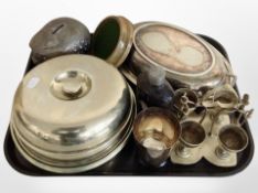 A group of silver-plated wares including entrée dish, set of egg cups on stand, hip flask,