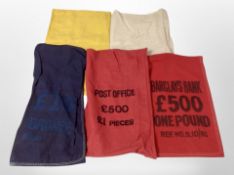 A group of cloth money sacks.