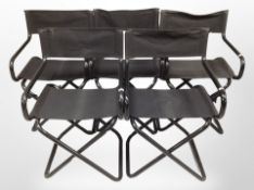 A set of five folding black metal director's style chairs with canvas sling seats