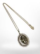 A 9ct yellow gold citrine pendant on chain CONDITION REPORT: 9.8g gross.