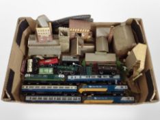 A box of Hornby inter-city 125 and other diecast rolling stock, model railway buildings, track.