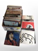 A box of LP records of various artists, some Danish examples.