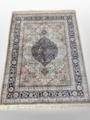 A Kashmir silk-piled rug, 176cm x 125cm.