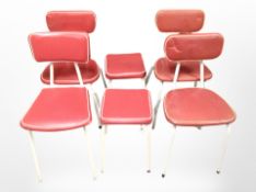 Two pairs of two 20th century Scandinavian red leather dining chairs on metal legs and two matching