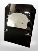 A bathroom mirror, width 56cm.