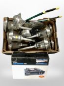 A portable gas cooker and a further box containing exterior solar power lights, metal cat ornament,