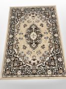 A machine made Persian design rug,