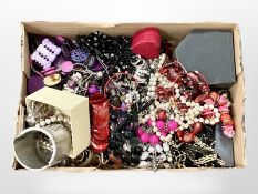 A large collection of costume jewellery including rings, necklaces, chains, etc.